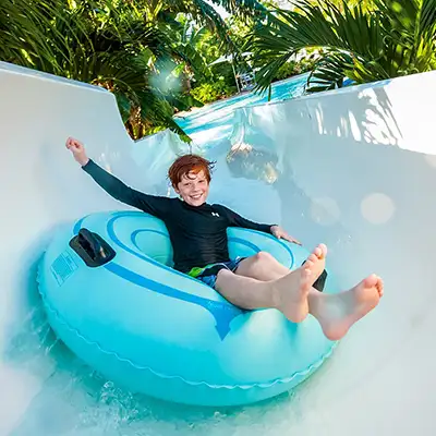 A boy on a water slide at Beaches Turks & Caicos (c)Sandals