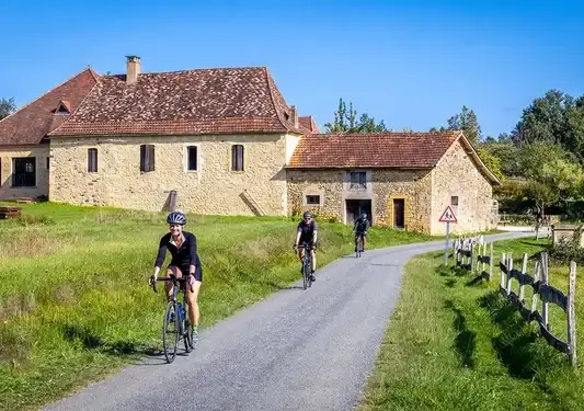 Cycling through a french village (c)Backroads