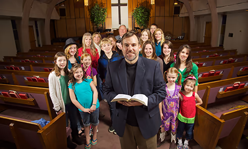 A family riding a waterslide