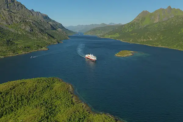 Expedition Ship Sailing Through Lysefjord in Norway (c)Hurtigruten