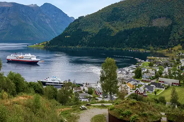 Expedition Ship visiting a village in Hjørundfjord Norway (c)Hurtigruten