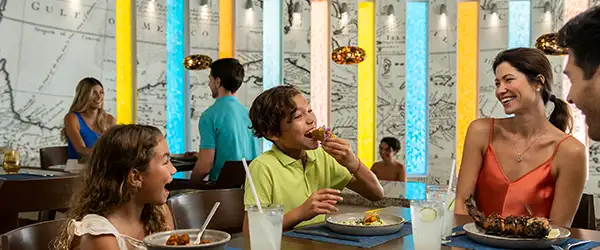 A family eating tacos (c)Palace Company