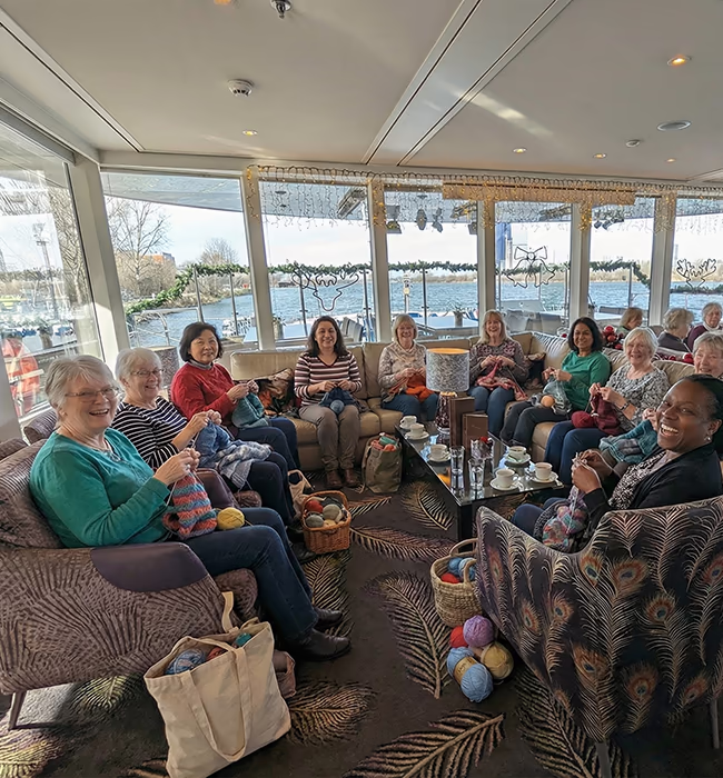 A knitting circle on a river cruise