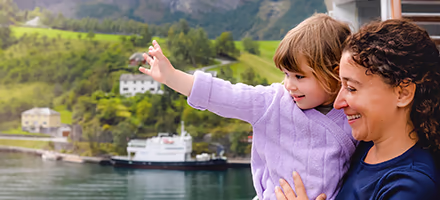 A mom and daughter on a European river