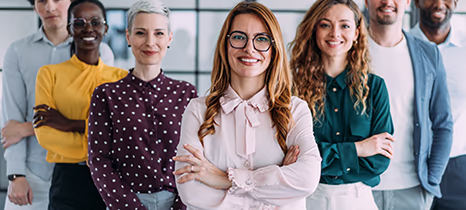 Group of employees celebrating on the beach