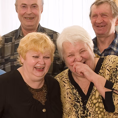 Two older women laughing
