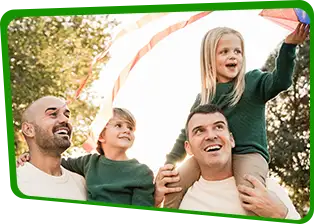 Two dads with their kids