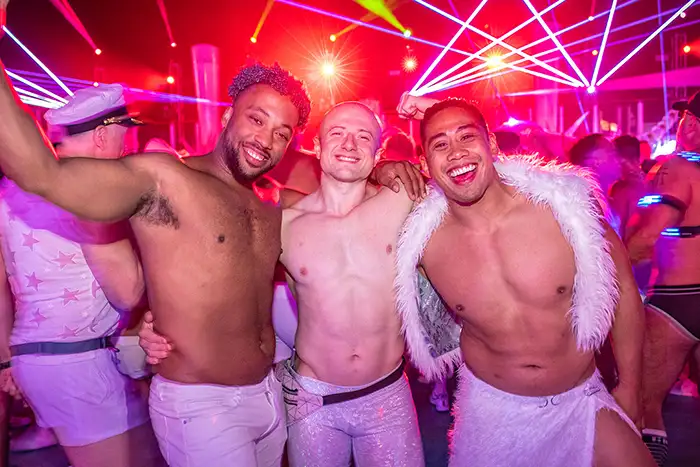 Three men party on an Atlantis Cruise