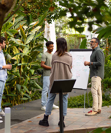 A strategy meeting outside at a resort