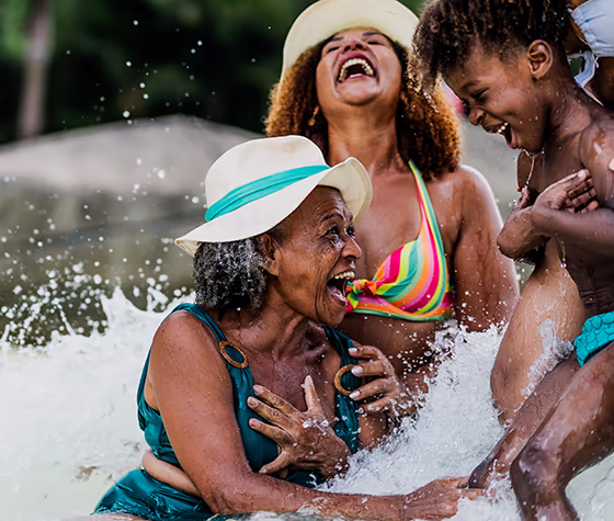 African american family playing at the beach