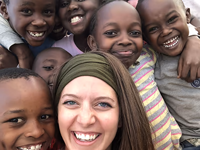 Woman with group of local Kenyan kids