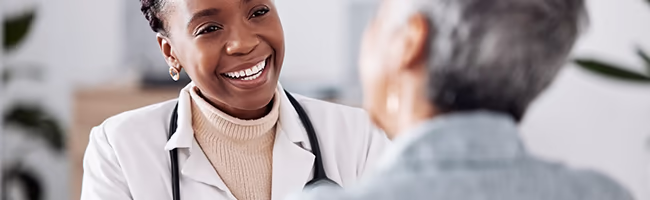 A doctor consults with a patient